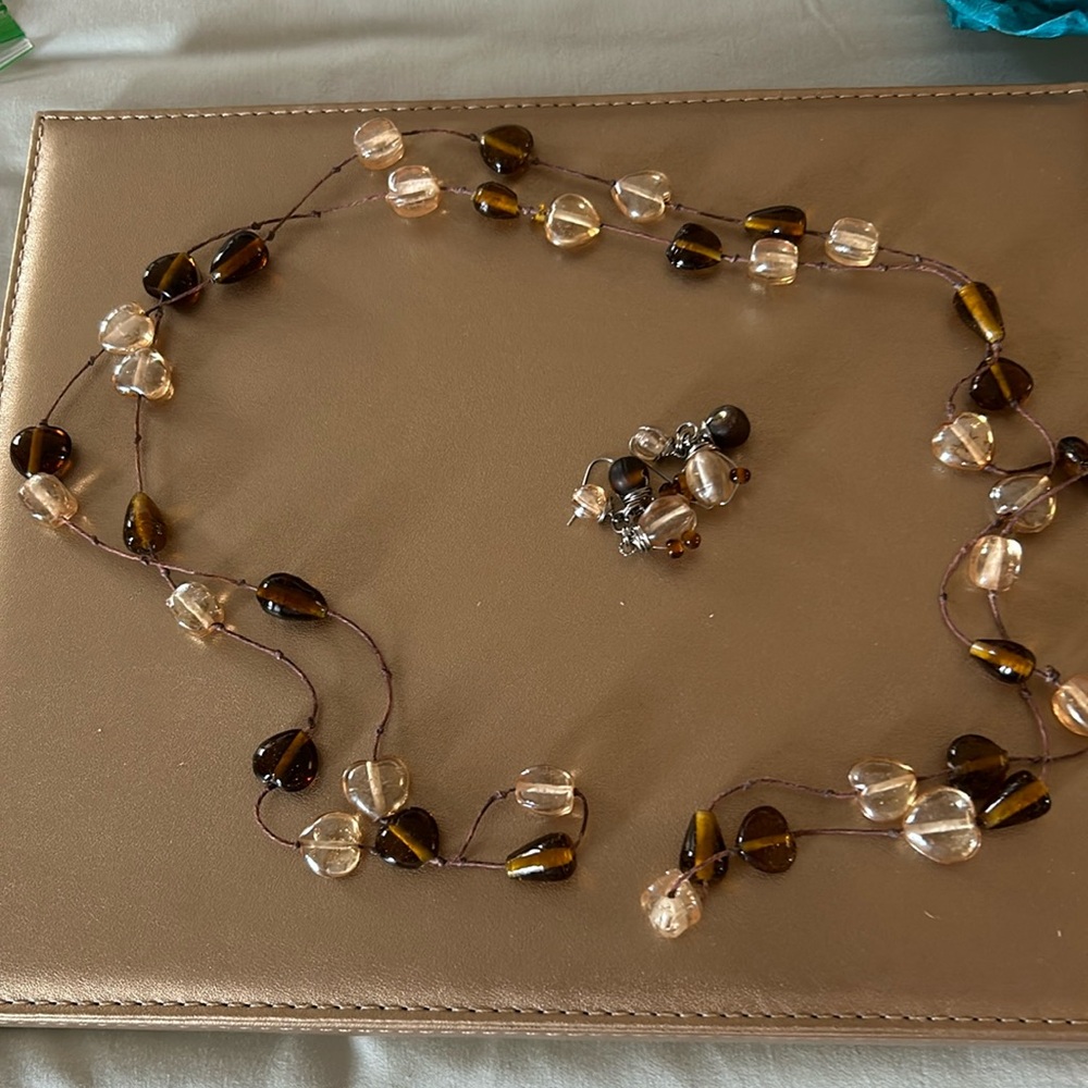 Beautiful brown and clear matching necklace and earrings